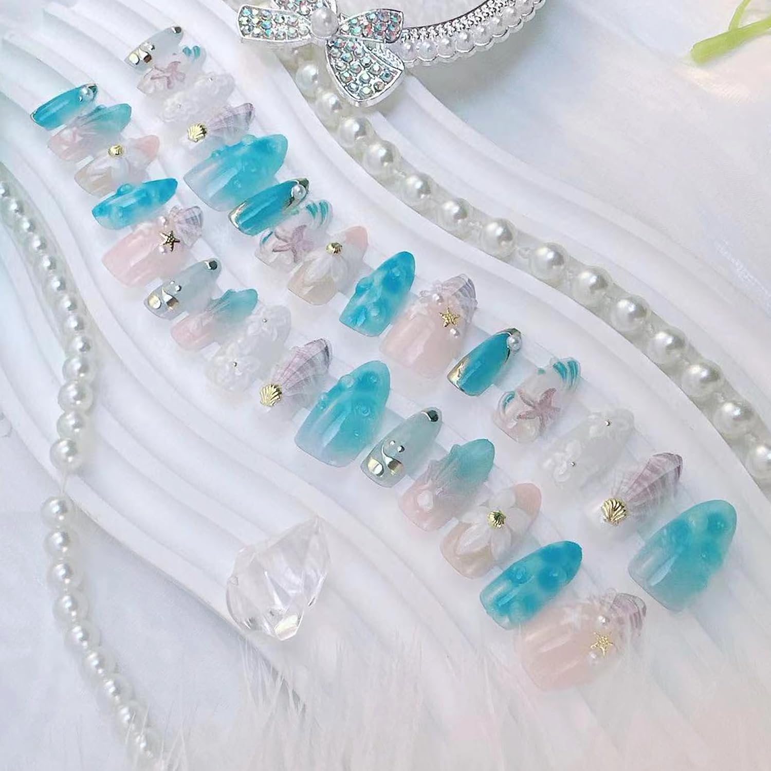 BSBTBZ nails worn on hand at beach for vacation-ready polished look