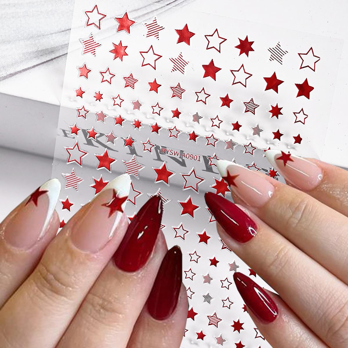 BSBTBZ next to a ruler showing star sticker sizes for accurate nail fit
