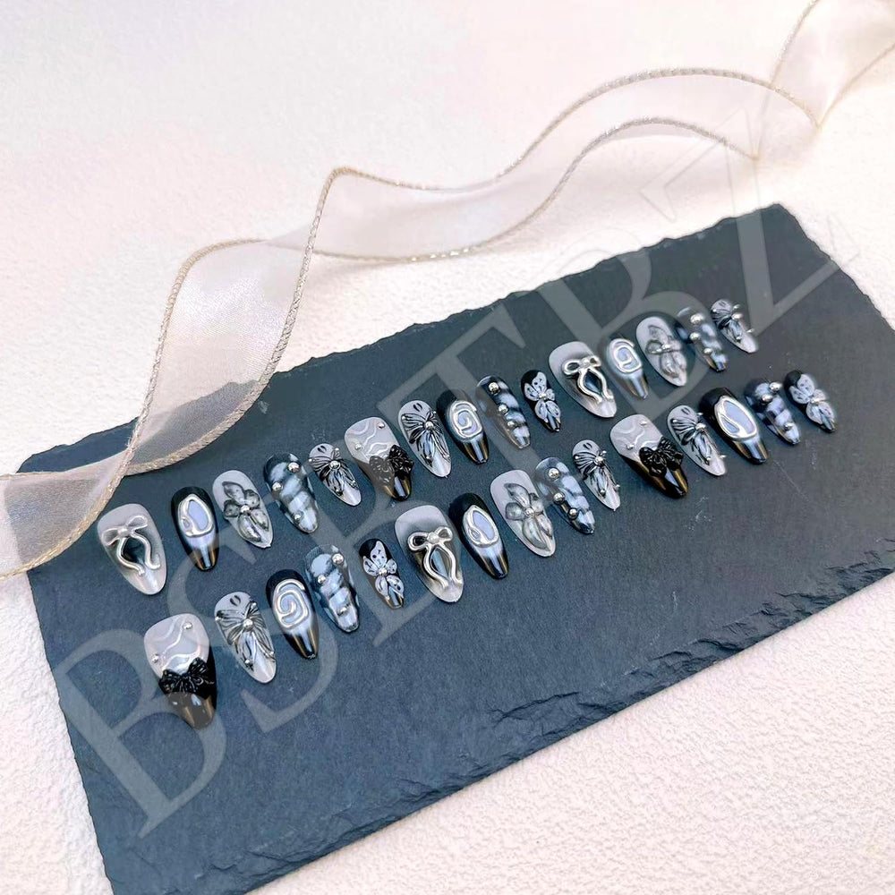 BSBTBZ close-up of 3D flowers and silver swirls adding textured shine