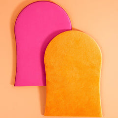 B.TAN mitt worn on hand demonstrating clean, stain-free application