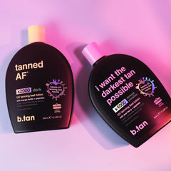 B.TAN bottle next to hand for scale, showing convenient 12 fl oz travel-friendly size
