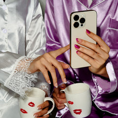 BTArtbox press-on nails held in hand to show size and almond shape for correct fit