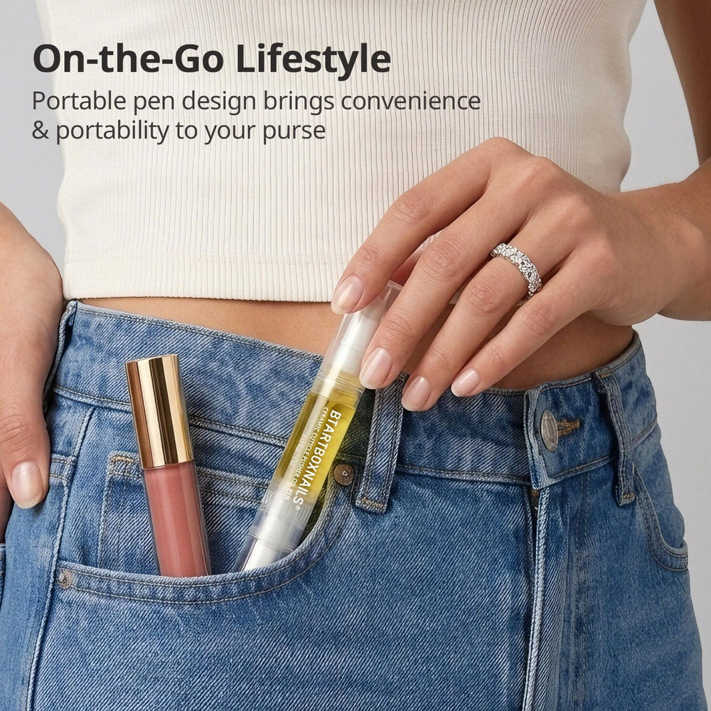BTARTBOXNAILS pen next to hand for scale showing travel-friendly compact size