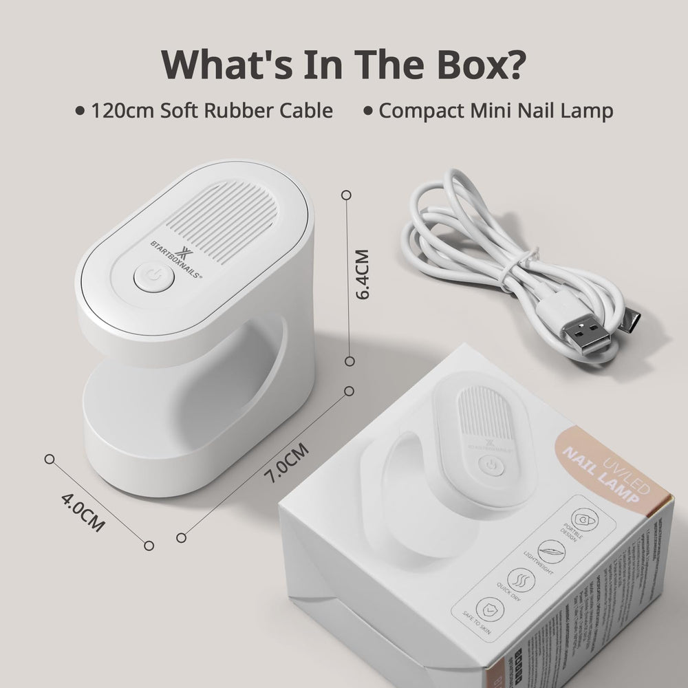 BTArtboxnails lamp held in hand for scale highlighting pocket-sized travel benefit