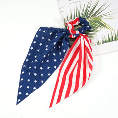 Budsmile scrunchie styled with patriotic outfit at a Fourth of July picnic