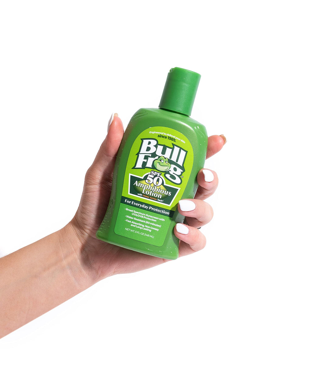 Bullfrog 5 oz bottle beside sunglasses to show travel-friendly scale