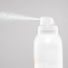 Bumble and bumble Blondish sprayed at roots demonstrating instant coverage and lift