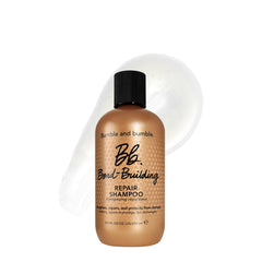 Bumble and bumble front bottle view showing restorative shampoo and benefits