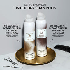 Bumble and bumble 4.4 oz can beside a hand for size reference and travel-friendly benefit
