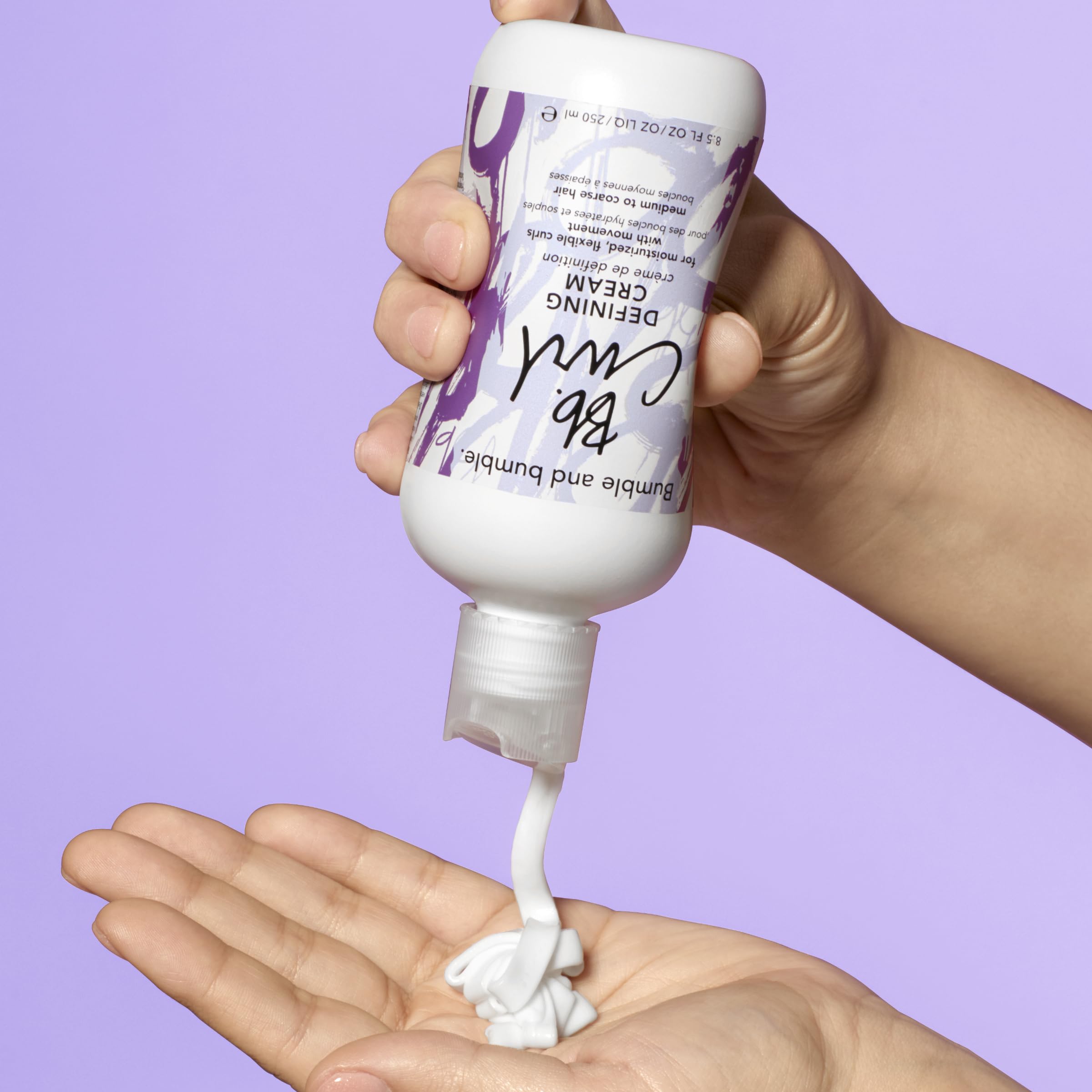 Bumble and bumble cream on hand demonstrating recommended application amount
