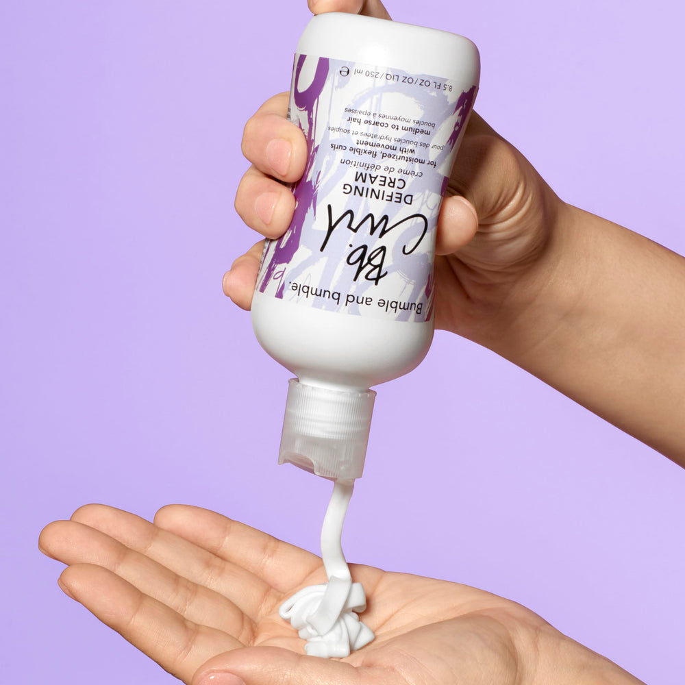 Bumble and bumble cream on hand demonstrating recommended application amount