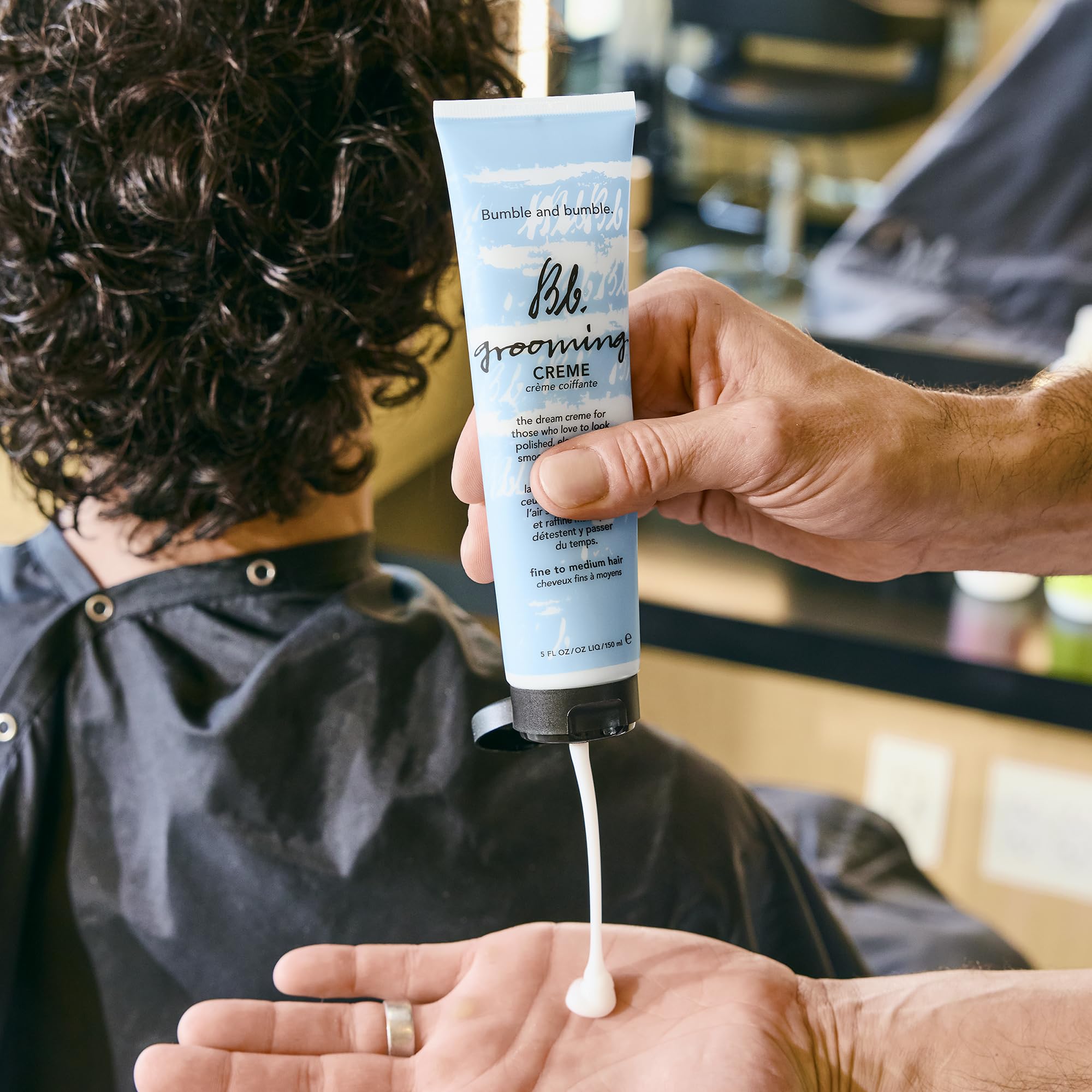 Bumble and bumble. product on damp hair before drying for frizz control