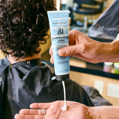 Bumble and bumble. product on damp hair before drying for frizz control