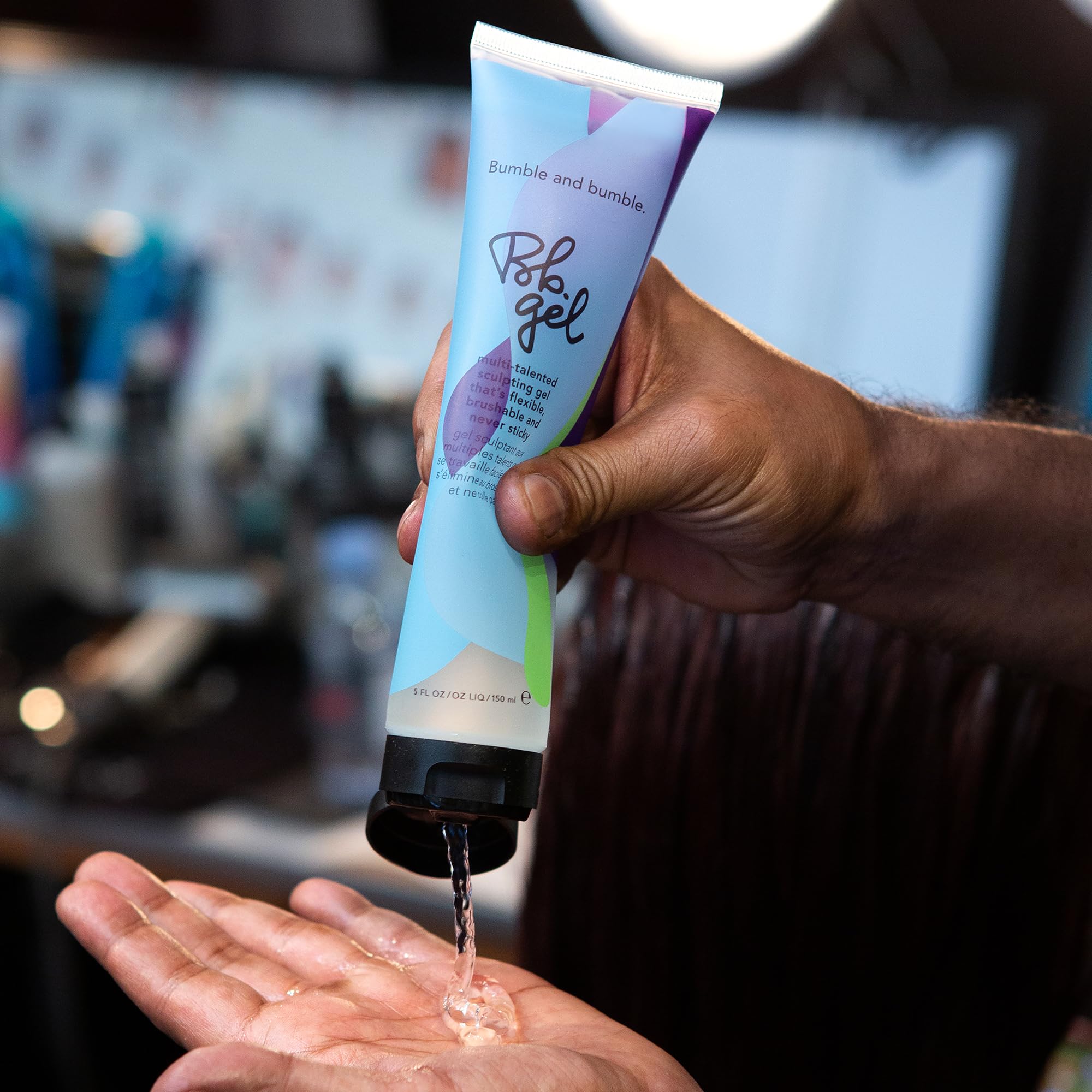 Bumble and bumble product in hand demonstrating compact 5 fl oz size