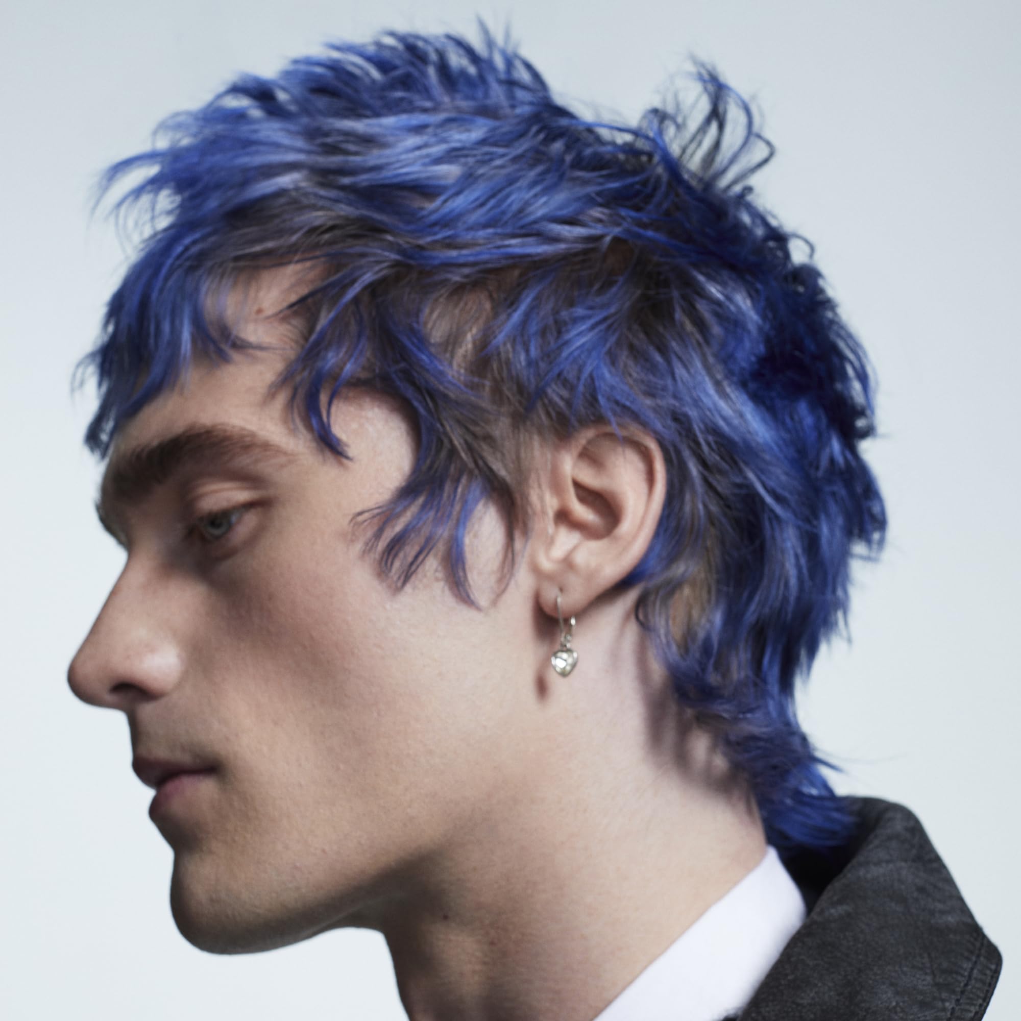 Bumble and bumble styled hair lifestyle image showing high-shine polished finish benefit