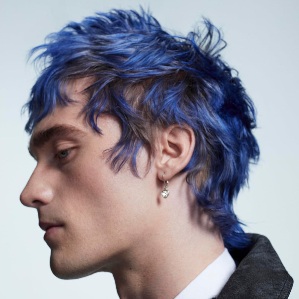 Bumble and bumble styled hair lifestyle image showing high-shine polished finish benefit