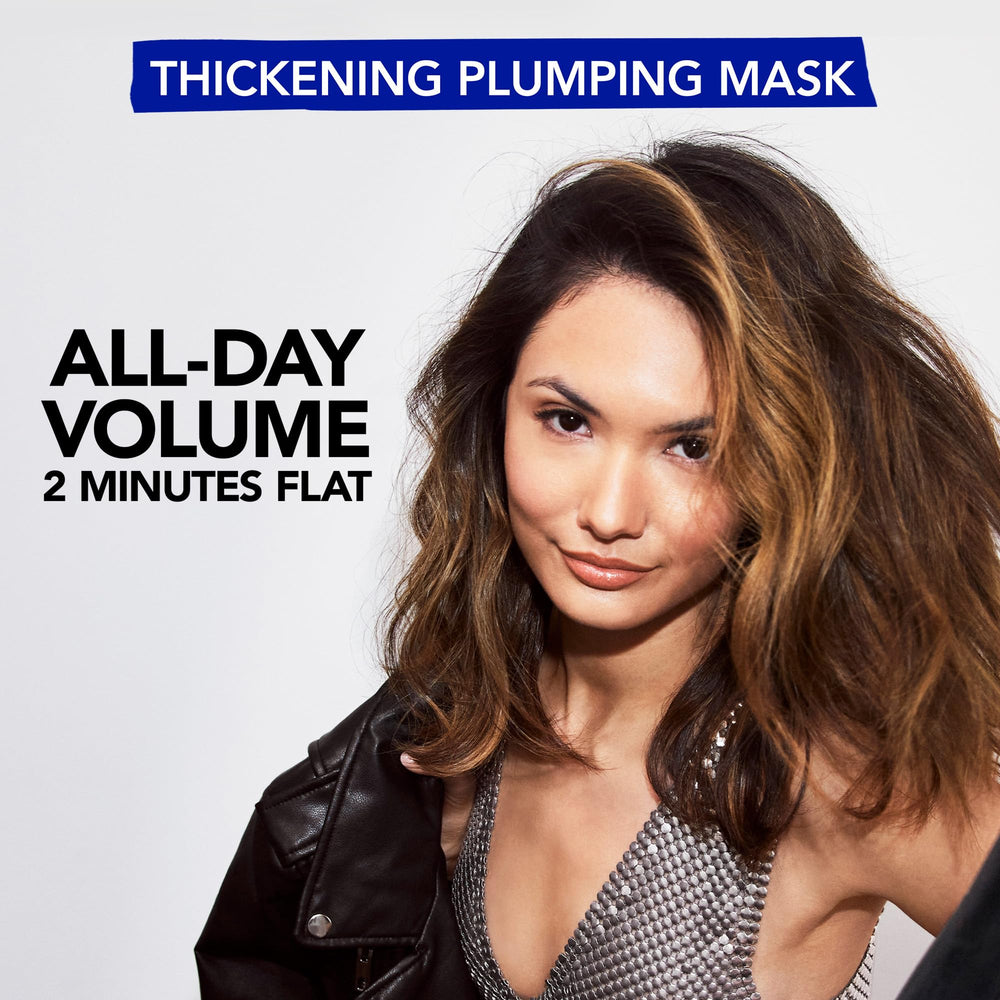 Bumble and bumble applying mask in hand for quick two-minute treatment benefit
