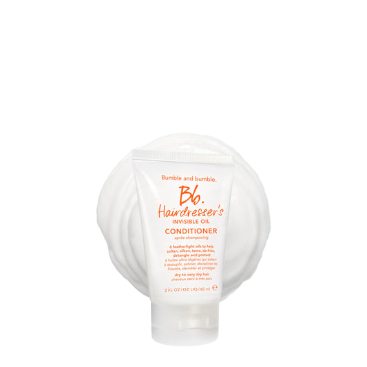 Bumble and bumble travel bottle front view showing compact packaging and portability