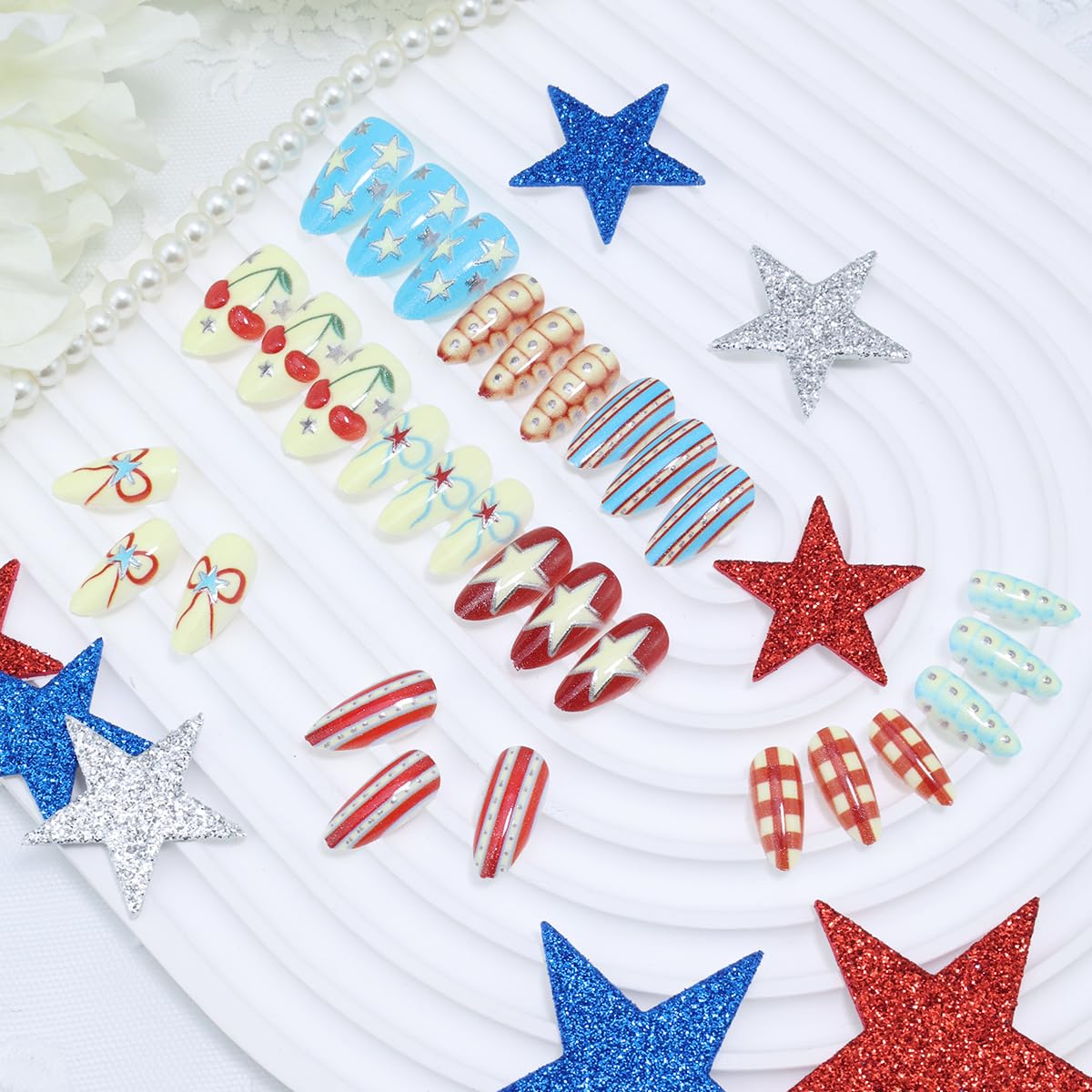 BUNLVDI close-up of almond nail patterns highlighting crisp stars and polka dots for showy detail