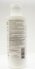 BurelPharma tube in hand showing 5oz scale and portable convenience
