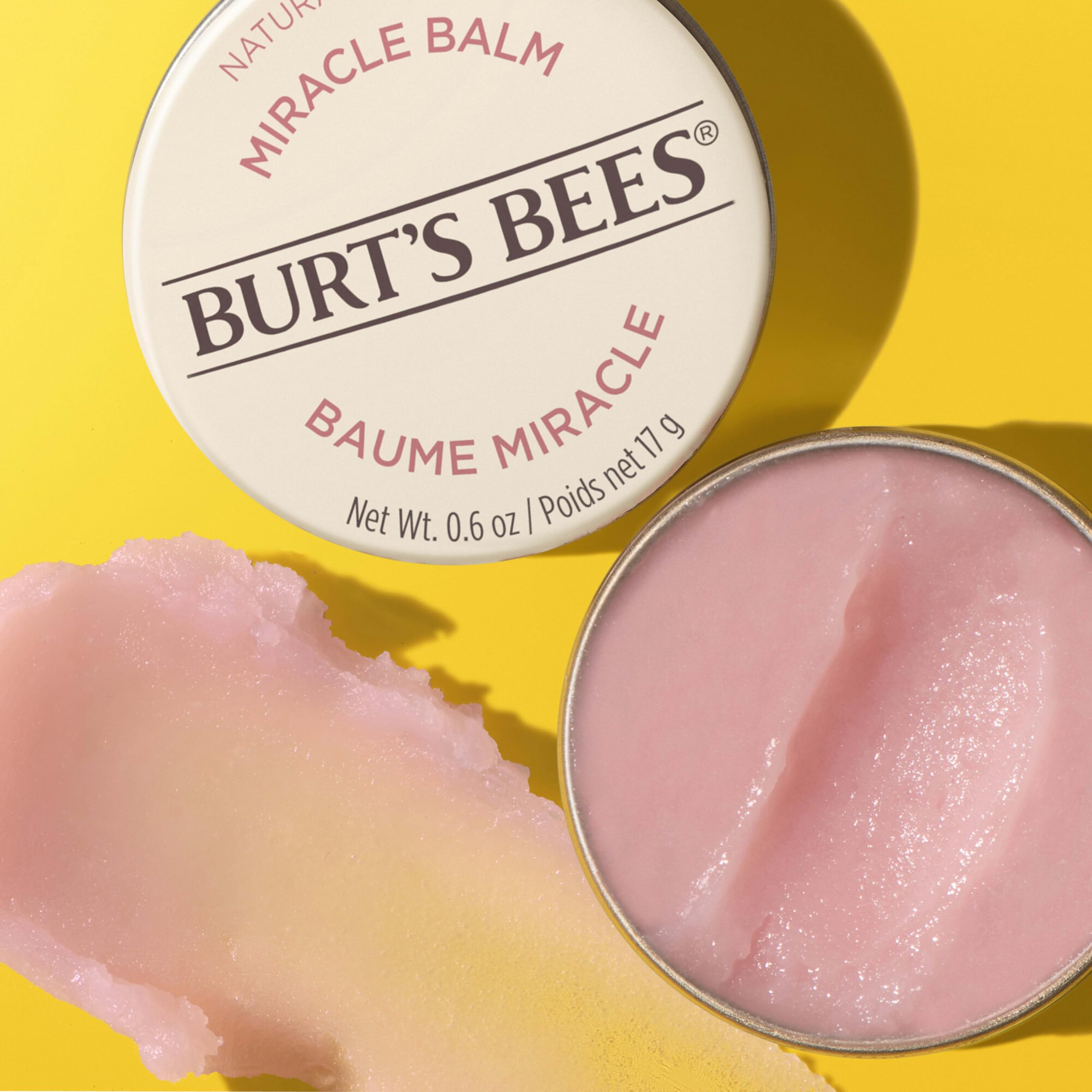 Burt's Bees balm smoothing cuticles to soften and condition nails