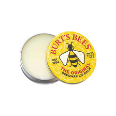 Burt's Bees tin on a desk lifestyle scene showing quick access and natural care for dry lips