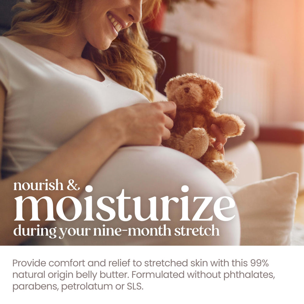 Burt's Bees applied on pregnant belly showing gentle moisturizing massage
