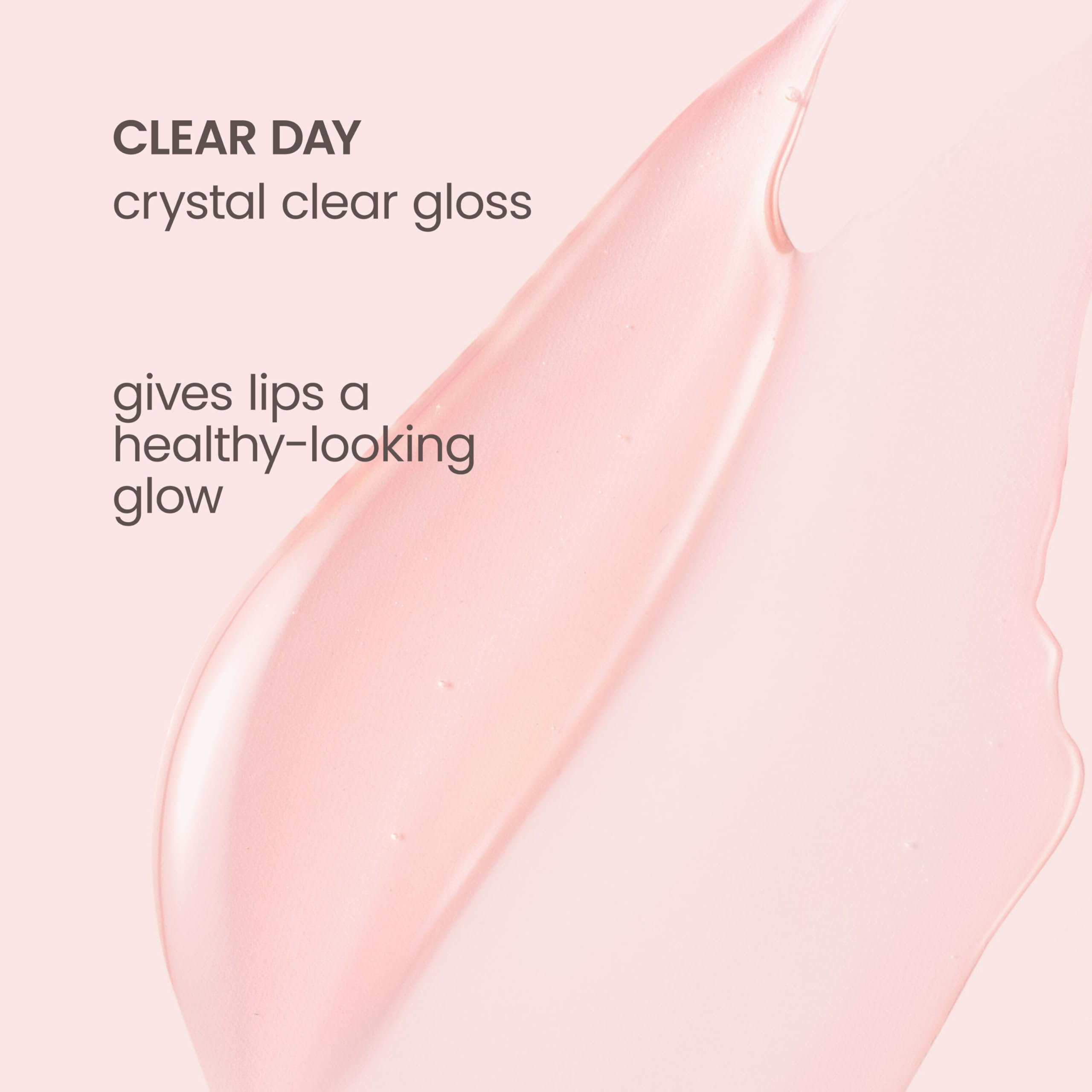 Burt's Bees clear lip oil flatlay with peach accent, pleasant flavor and clean formula