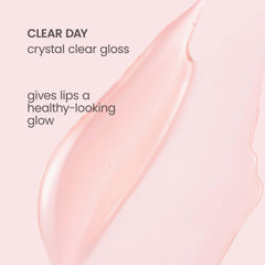 Burt's Bees clear lip oil flatlay with peach accent, pleasant flavor and clean formula