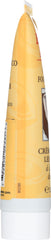 Burt's Bees tube next to keys showing travel-size convenience and readiness