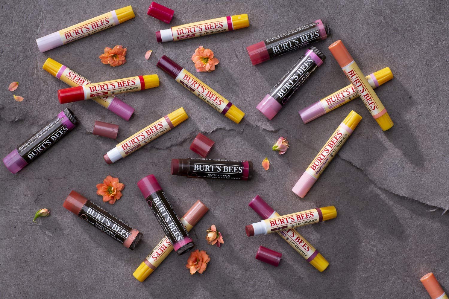 Burt's Bees swatches on skin showing sheer lilac tint and natural shine