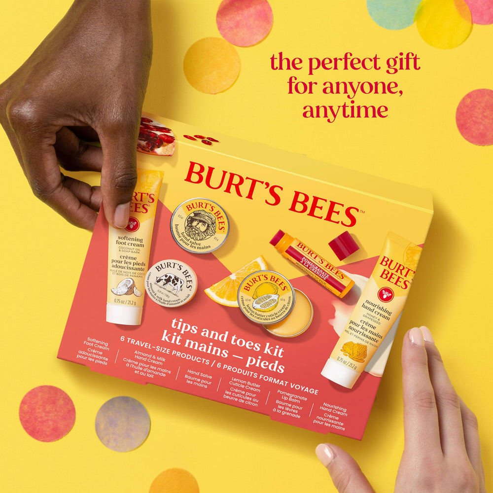 Burt's Bees products held in a hand for scale and travel-friendly size