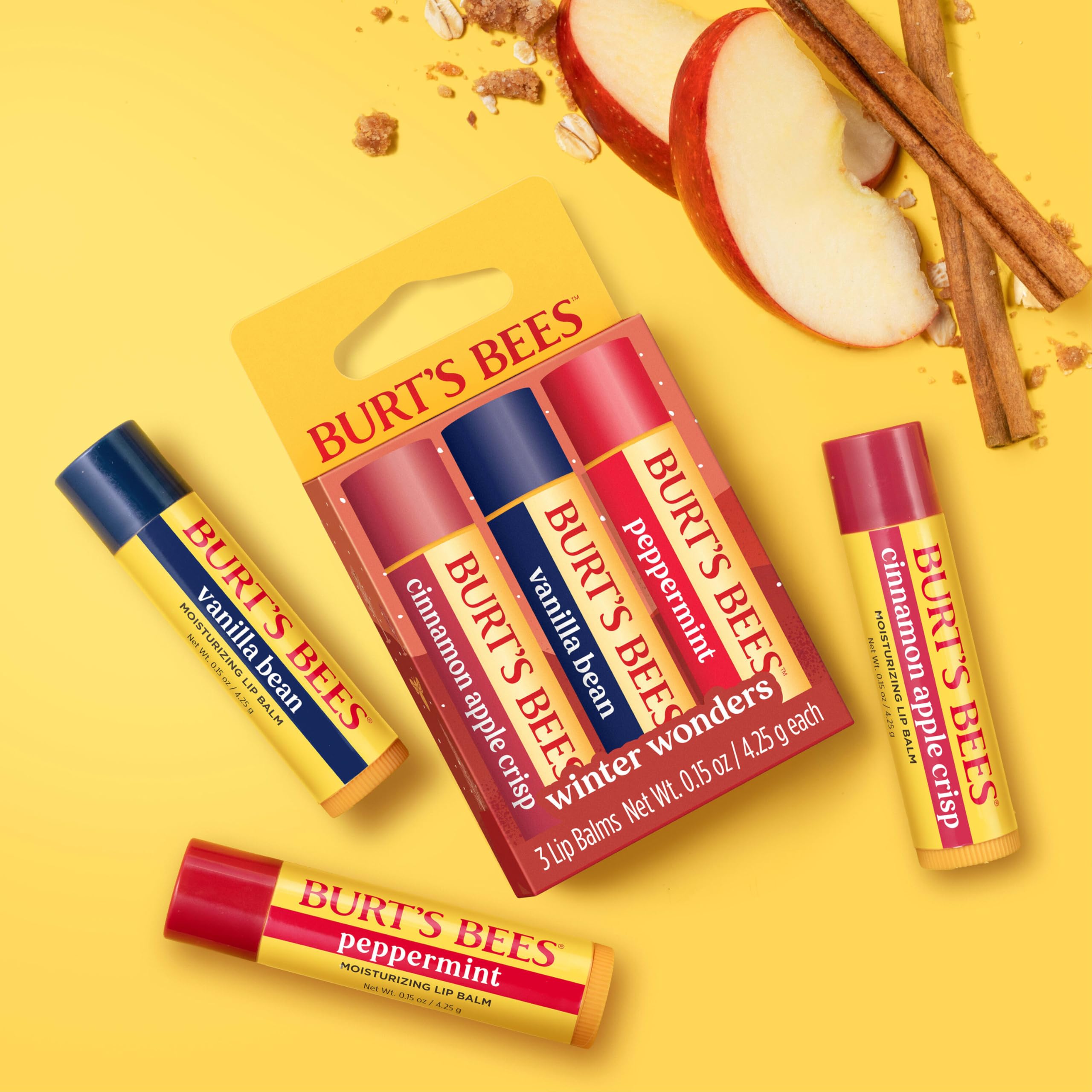 Burt's Bees lip balm held in hand showing compact size and travel-friendly convenience