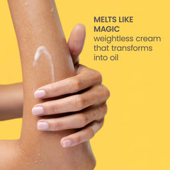 Burt's Bees tube in hand showing compact travel-friendly size