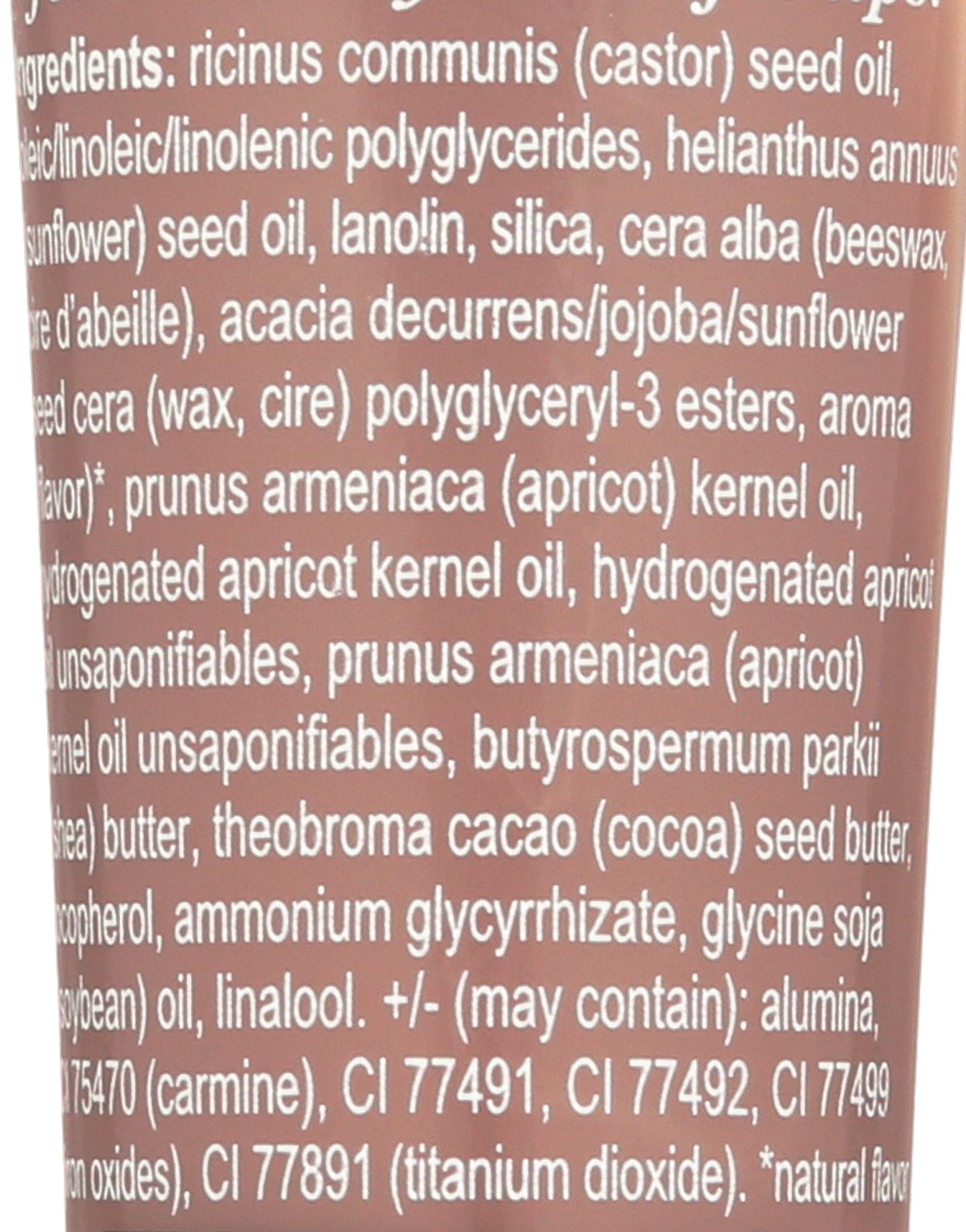 Burt's Bees closeup on lips showing natural plum tint and hydrated look