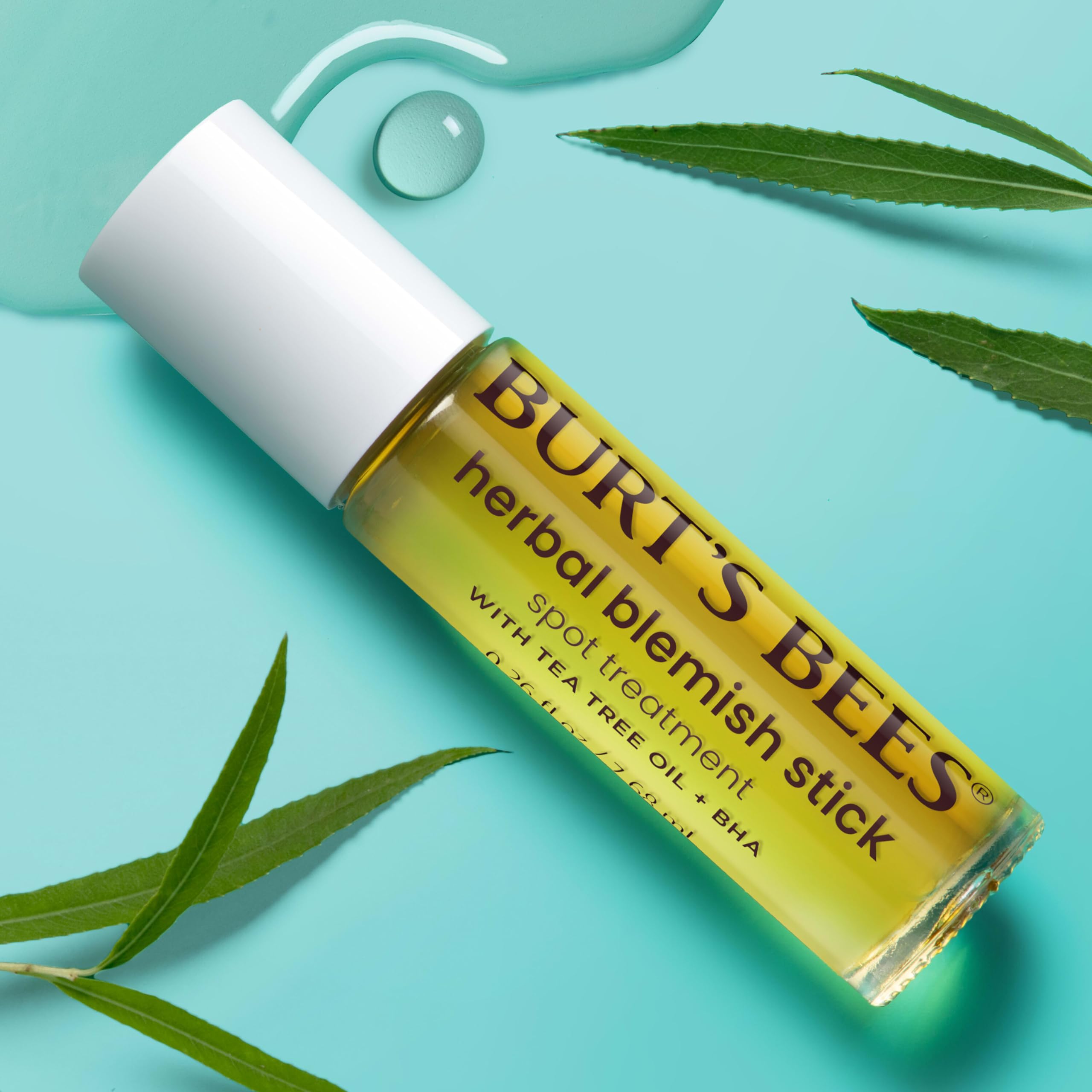 Burt's Bees stick applied to cheek in lifestyle shot showing targeted spot treatment