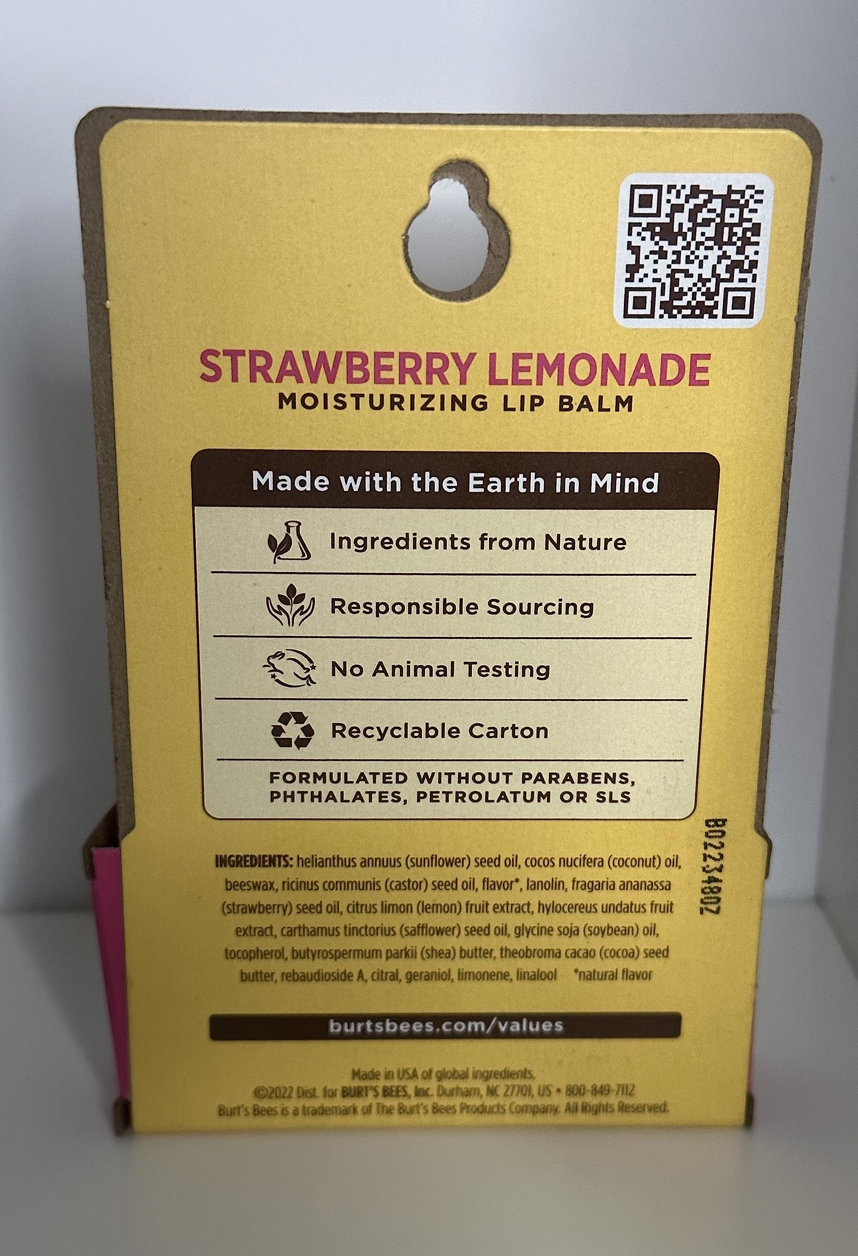 Burt's Bees close-up label showing ingredients and clean formulation benefits