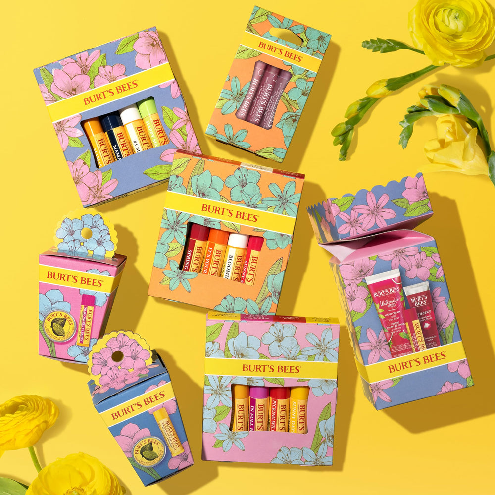 Burt's Bees Strawberry balm texture swiped on skin demonstrating moisturizing finish