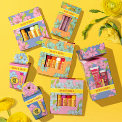 Burt's Bees Strawberry balm texture swiped on skin demonstrating moisturizing finish