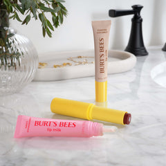 Burt's Bees product beside coconut and almond for toasted coconut scent