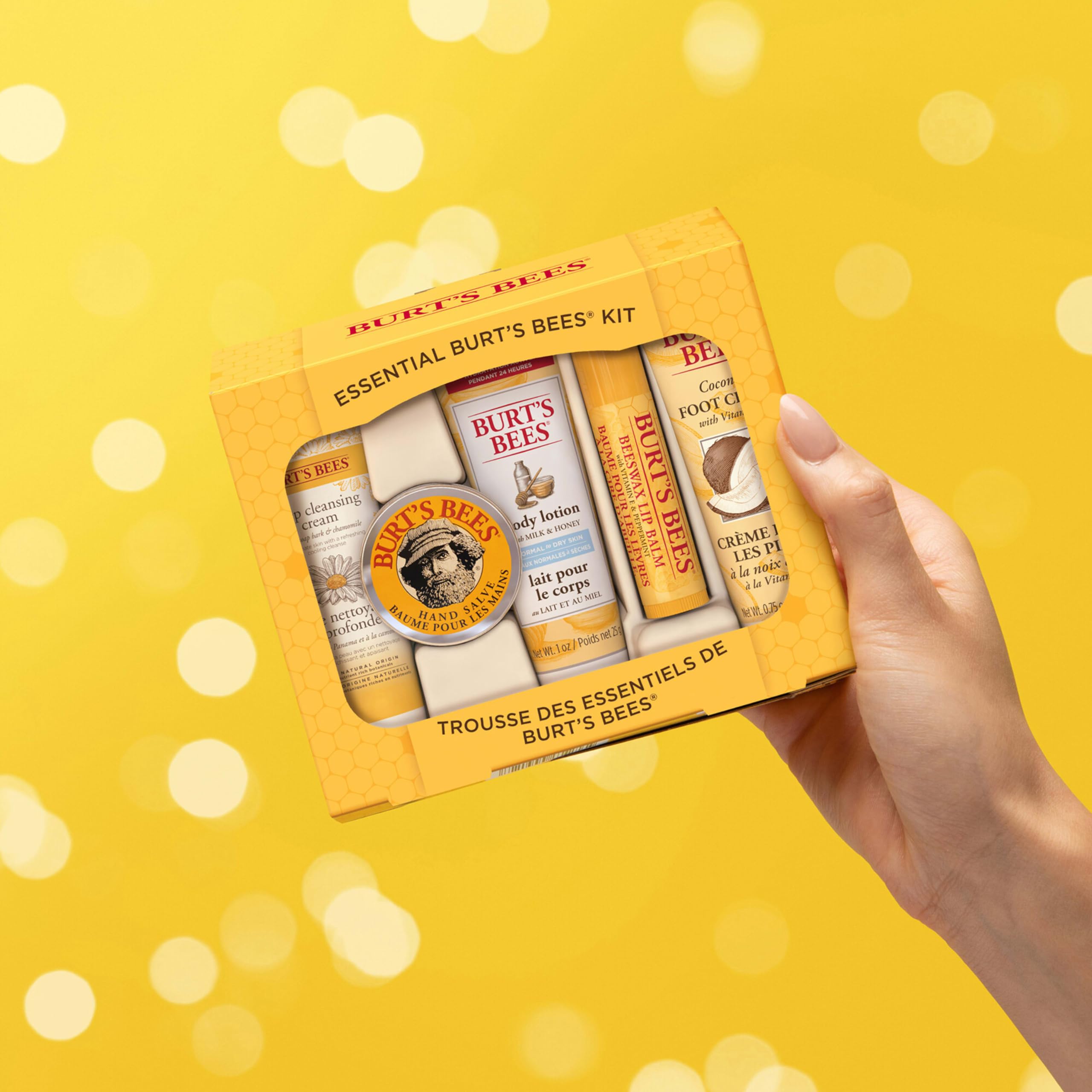 Burt's Bees travel products next to passport showing compact sizes for travel