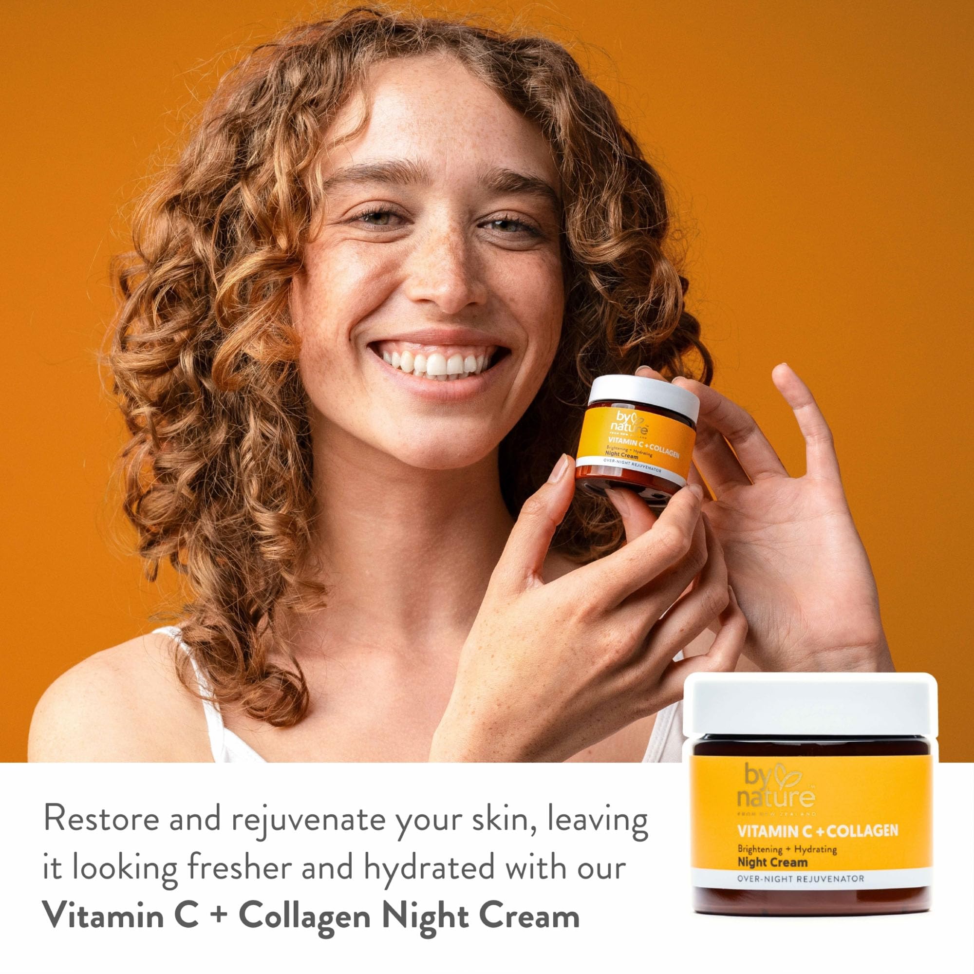 By Nature cream dispensed on fingertip demonstrating smooth, spreadable consistency