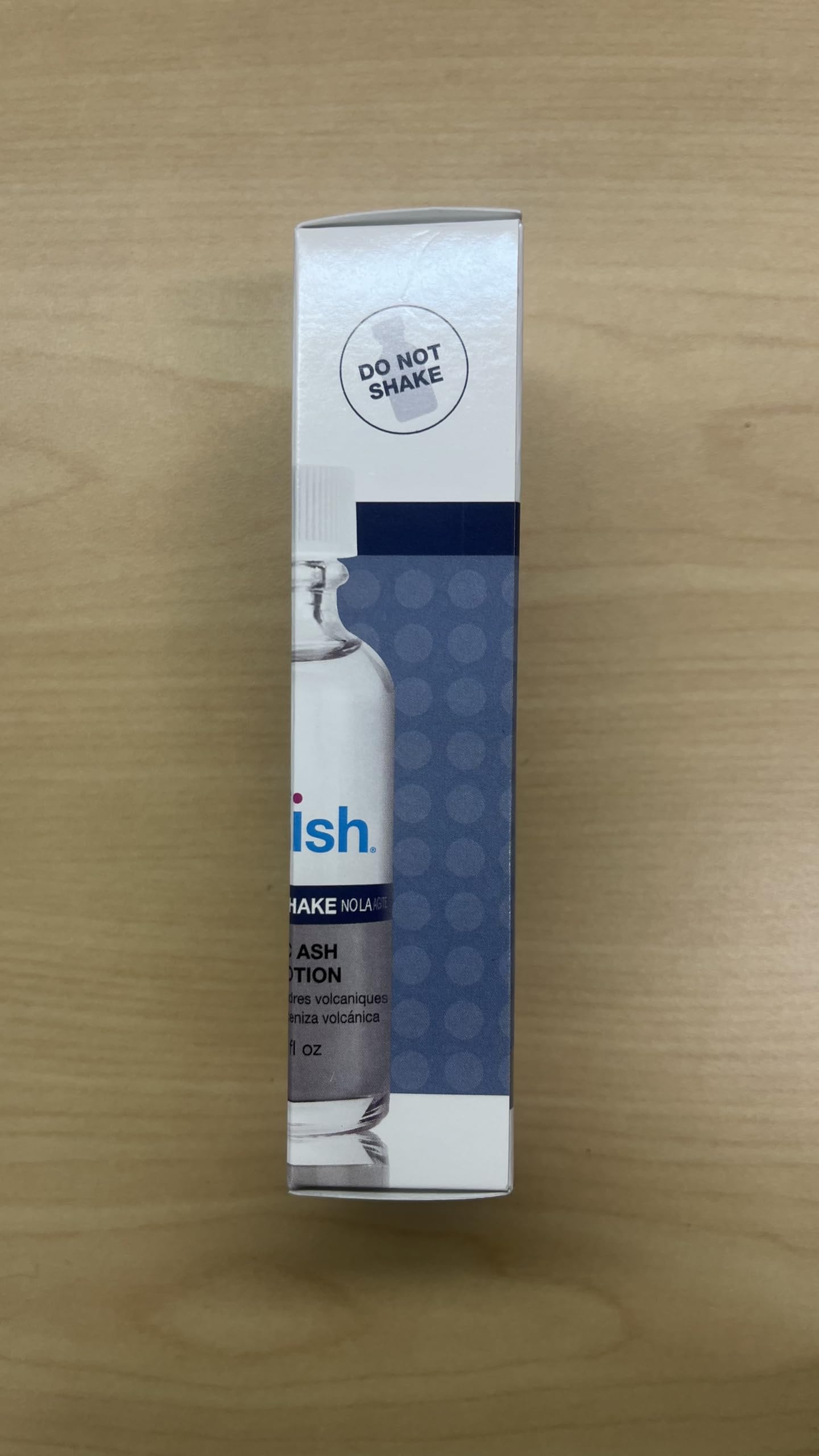Bye Bye Blemish bottle held in hand to show 1 fl oz scale and travel-friendly convenience benefit