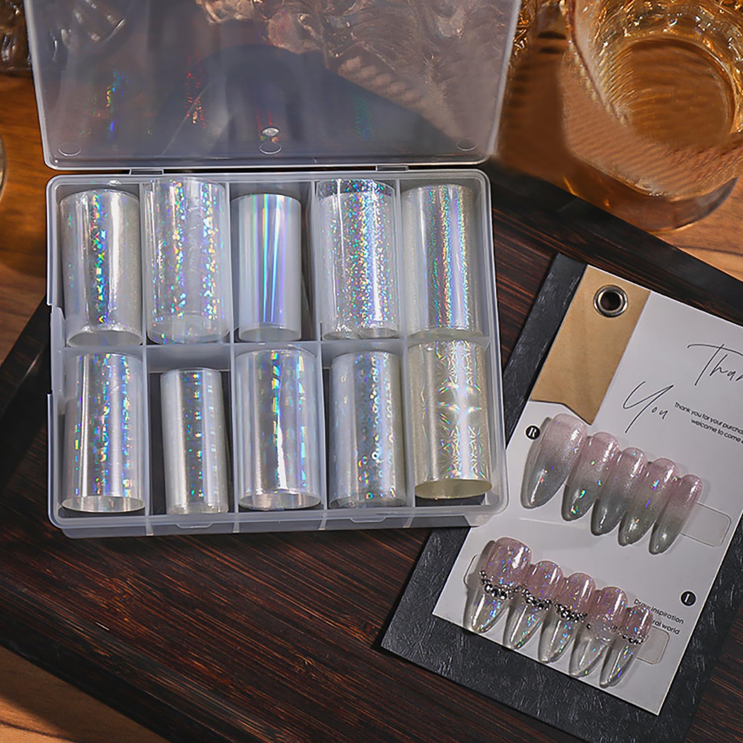 BYJKYEN short nails finished with aurora foil showing compact shimmer effect