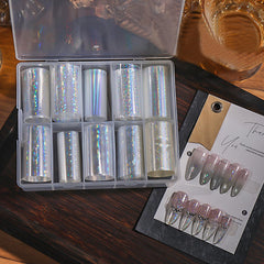 BYJKYEN short nails finished with aurora foil showing compact shimmer effect