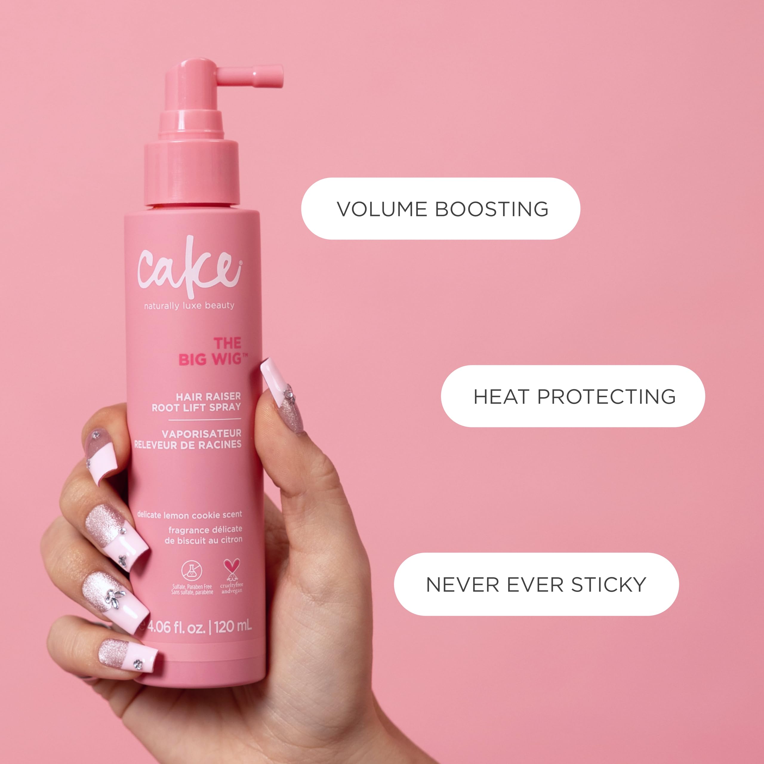 Cake Beauty bottle with lemon cookie props highlighting fragrance