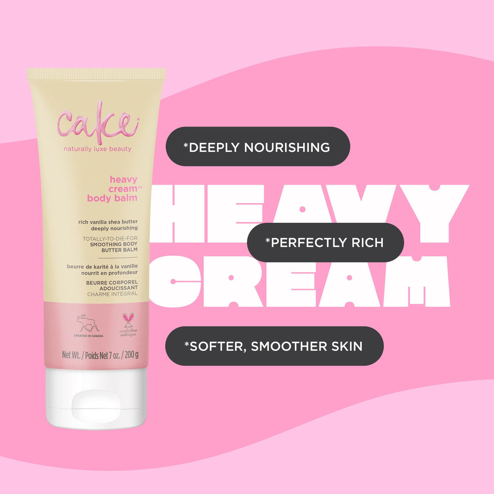 Cake Beauty lotion on vanilla pods and flowers illustrating warm French vanilla scent