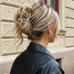 CAKURE bow clips pair on flatlay showing matching styling options