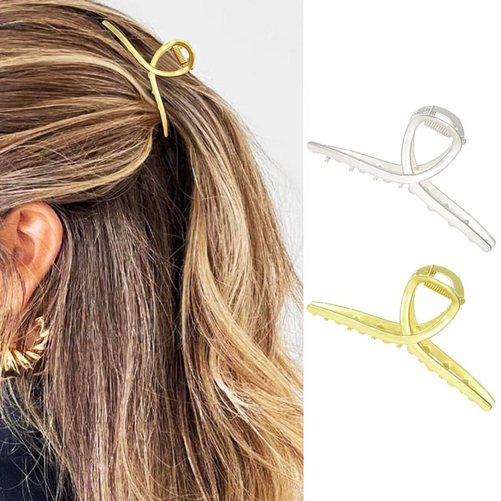 CAKURE gold claw clip front view shows compact elegant hold