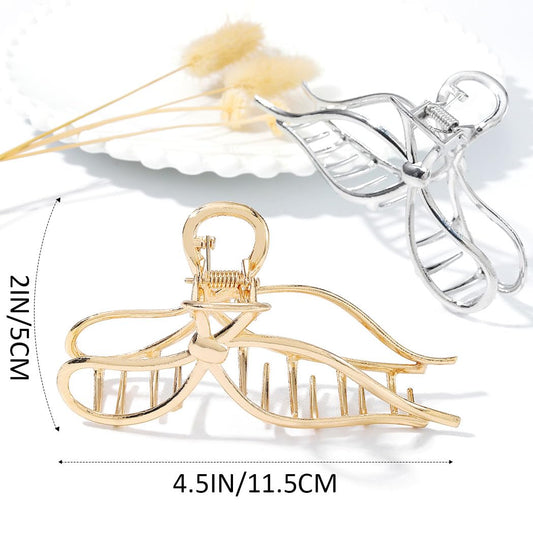 CAKURE gold bow clip side profile highlighting metal finish and spring
